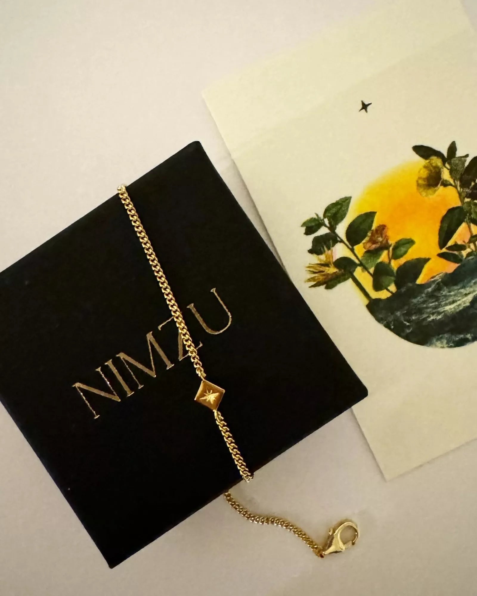 BRACELET WITH TINY COMPASS PENDANT