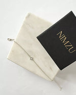 Afbeelding in Gallery-weergave laden, BRACELET WITH TINY COMPASS PENDANT
